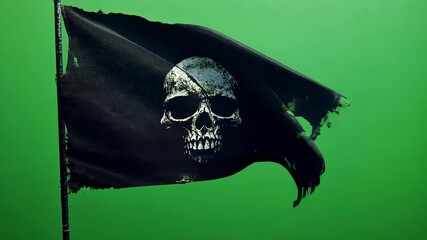 Tattered black pirate flag with skull and crossbones is waving in the wind on green screen background, perfect for compositing and visual effects