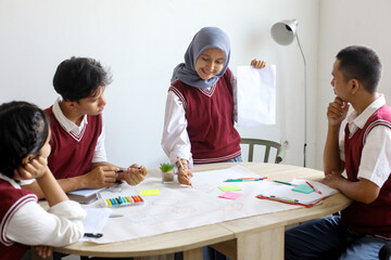 High School Students Doing School Work Together at The Study Room