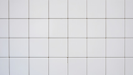 Background material made of square white ceramic tiles