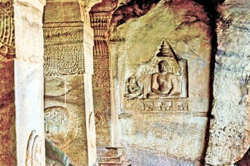 Jain God Mahavira relief sculpture, Rock cut cave temple, Badami, Bagalkot, Karnataka, India