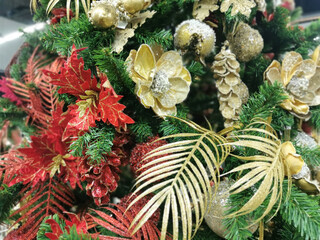 Fototapeta premium Christmas tree decorated with Pine Cone And Branches. Closeup cone