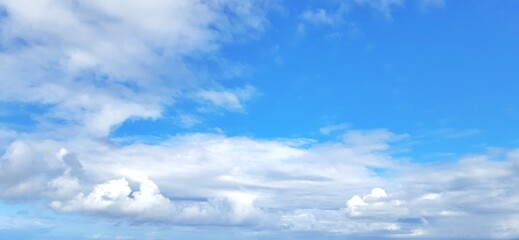 Beautiful blue sky with white clouds. Cloudy background