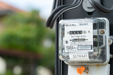 Electric measuring power meter for energy cost at home and office.