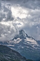 Dramatic cloud, The Matterhorn under a cloudy sky, hike in Switzerland Zermatt, Swiss Alps