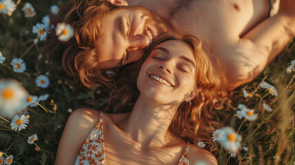 Naklejka premium Joyful couple lying in vibrant wildflower field, smiling and enjoying beauty of nature and each other company, capturing essence of carefree happiness and romantic bliss