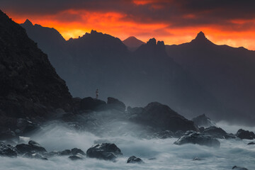 Beautiful sunset at Benijo beach in Tenerife, Dramatic clouds and beautiful light create beautiful views.