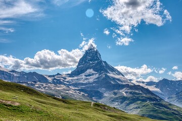 View on Matterhorn with mountain lake, Zermatt, Switzerland, Alps, Wallis, cloudy sky