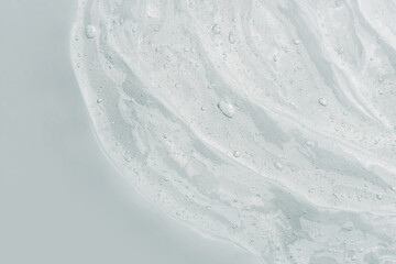 Transparent gel texture on a white background.