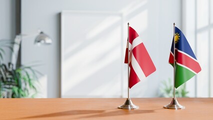 FLAGS OF DENMARK AND NAMIBIA ON TABLE