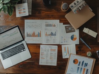Obraz premium Business Reports and Charts on Desk Workspace