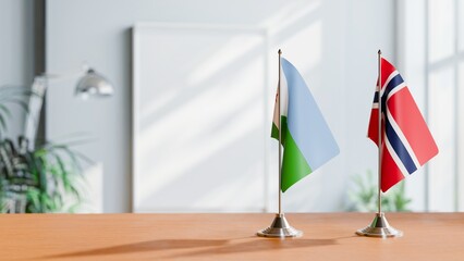 FLAGS OF DJIBOUTI AND NORWAY ON TABLE