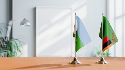 FLAGS OF DJIBOUTI AND ZAMBIA ON TABLE
