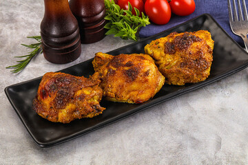 Roasted chicken thighs  with spices