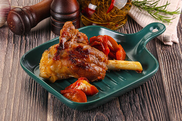 Baked lamb shank with vegetables