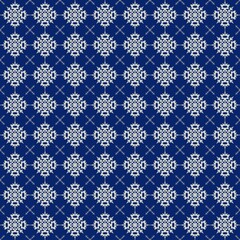 seamless pattern design of snowflakes on dark blue background