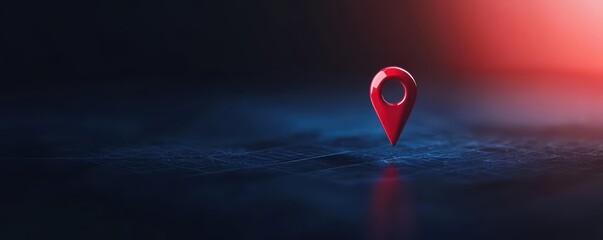 Fototapeta premium Red location pin over a dark background with soft lighting reflections.