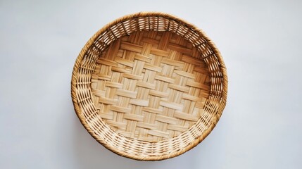 Woven wicker basket on white background