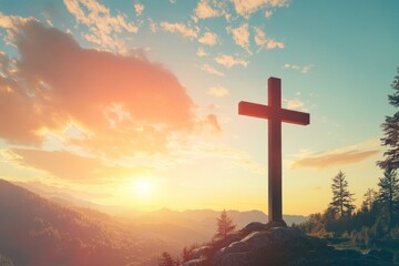 Sunset cross on mountain peak