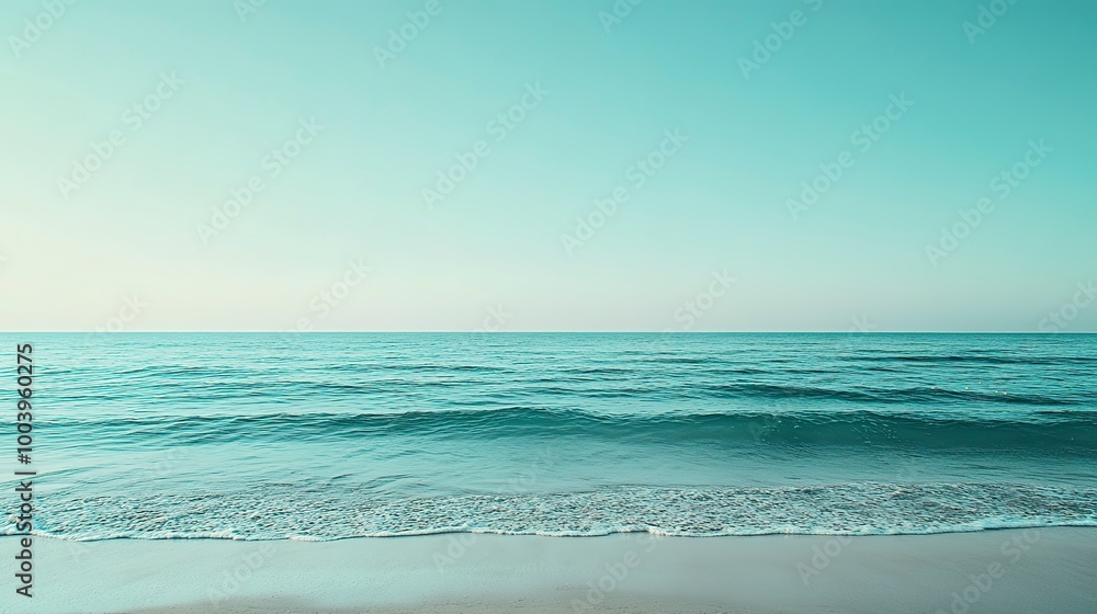 Sticker Serene Beach with Turquoise Waters and Clear Sky, The serene scene of a beach with gentle turquoise waters under a clear sky invokes a feeling of peace and relaxation. 