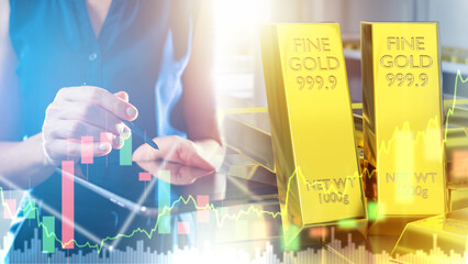 Trading with pure gold. Hands investor with electronic tablet. Trading on precious metals market....