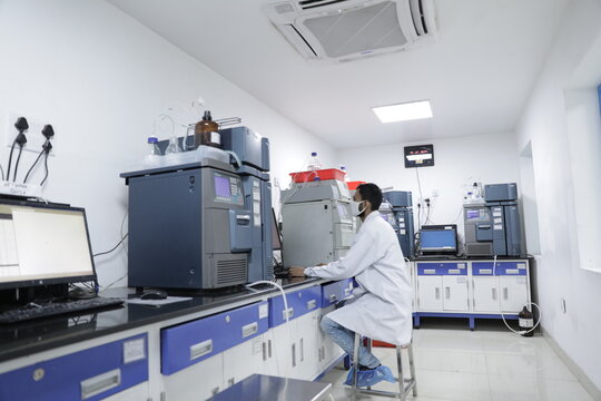 science laboratory with hplc, spectrometer, gc, uv, ir in background. hi tech latest machines and equipments in a Science experiment lab for research analysi, clinical trial study. fda approved labs	
