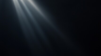 Obraz premium Graceful light beams shine through darkness on a black backdrop, adding elegance and mystery to your designs