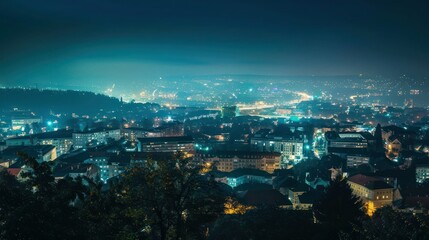Fototapeta premium Cityscape at Night: A European cityscape illuminated at night with lights