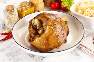Baked pork knee with spices