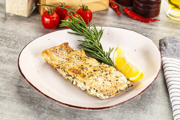 Baked salmon fish served rosemary