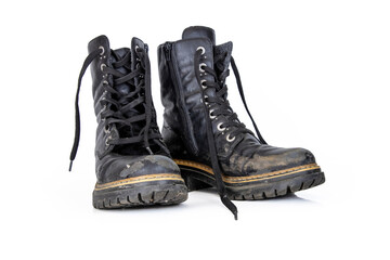 Pair of rugged worn black ankle leather combat boots with  thick, sturdy soles and laces. Two...