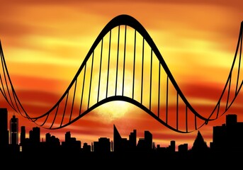 Silueta de una ciudad con puente al atardecer