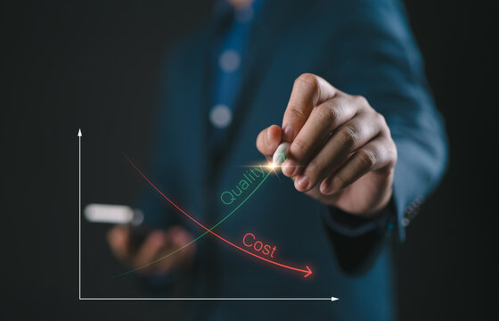 Businessman write down arrow with cost and up arrow with quality for business project management strategy have to control budget cost and improvement quality of product and service concept.