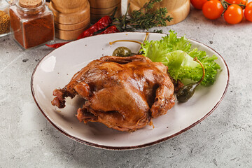 Baked small chicken with spices