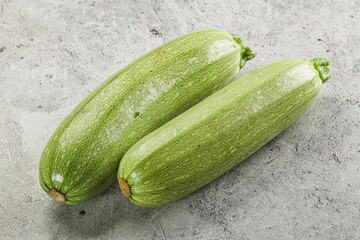 Raw green ripe zucchini vegetable