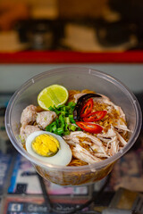 spicy lemongrass soup noodle with Soft-boiled eggs