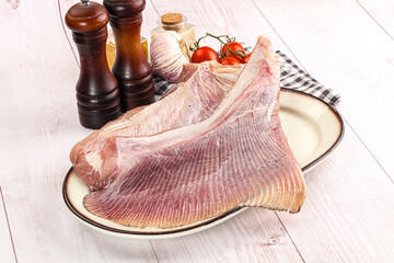 Raw uncooked stingray fish wing