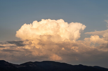 Sky storm clouds nature. Blue cloud landscape over mountain. Beautiful cloudscape sunset, sunrise.