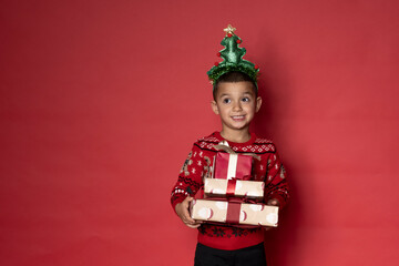 Cute young latino boy is ready for Christmas.