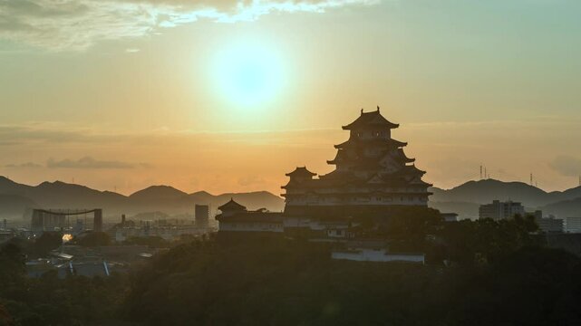 Himeji, Japan, timelapse view of sunrise over Himeji Castle, zoom in.	
