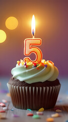Birthday cupcake with lit birthday candle. Number five for five years or fifth anniversary.