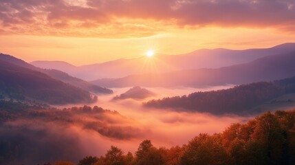 Fototapeta premium Majestic Autumn Sunrise Illuminating Misty Mountain Peaks - Inspiring Nature Photography