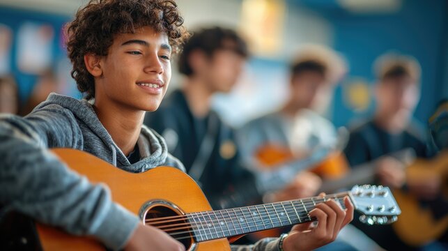 Developing Musical Talent: Male Teenage Students Embrace Guitar Skills in High School Music Class
