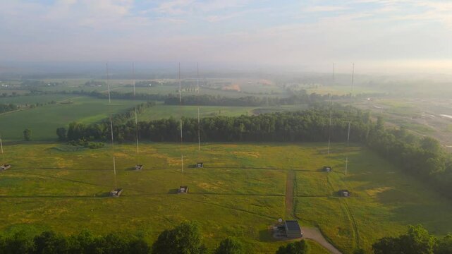 Aerial view of radio antenna mast array in a rural landscape, Michigan, USA