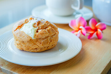 Delicious choux cream at restaurant.