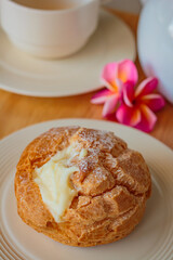 Delicious choux cream at restaurant.