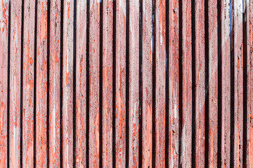 Peeling paint corrugated metal. Grunge background scratched and worn surface. Stripes pattern....