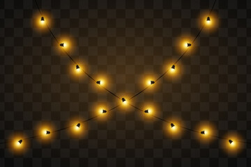 Festive lights. String of glowing golden lights arranged at an angle. Ideal for decorating events, holidays, or outdoor settings. The dark background highlights the glowing elements.