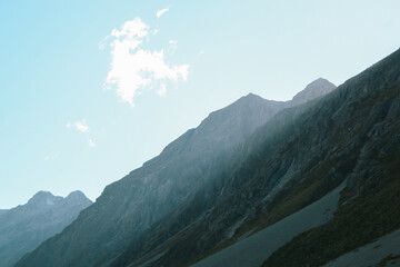 Mountain Range with Sunlight Streaking Through