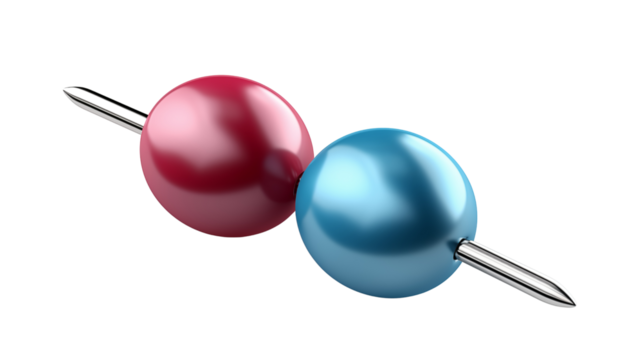 A single red and blue push pin with a silver needle, studio view, isolated on white background.