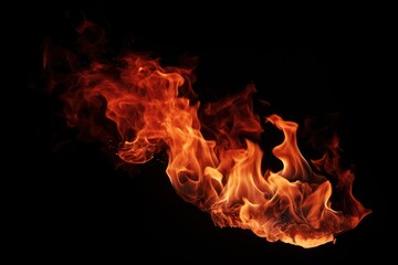 Fototapeta premium Fire flames bonfire black background fireplace.